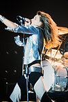 https://upload.wikimedia.org/wikipedia/commons/thumb/f/fb/David_Lee_Roth_-_Van_Halen.jpg/100px-David_Lee_Roth_-_Van_Halen.jpg
